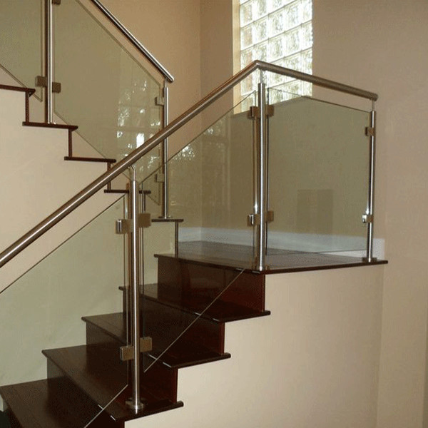 indoor wood steps glass railing handrail