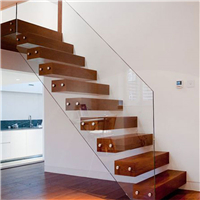 Stainless steel floating staircase with glass