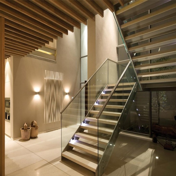 indoor u shape staircase with clear glass railing