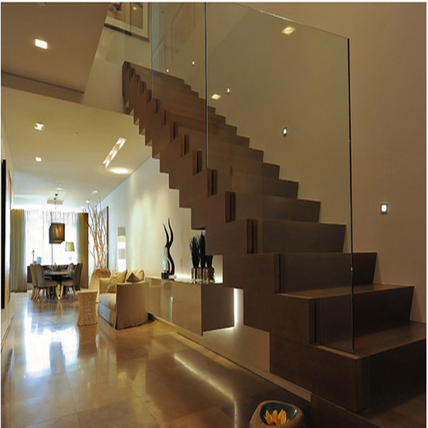 indoor staircase with topless glass railing